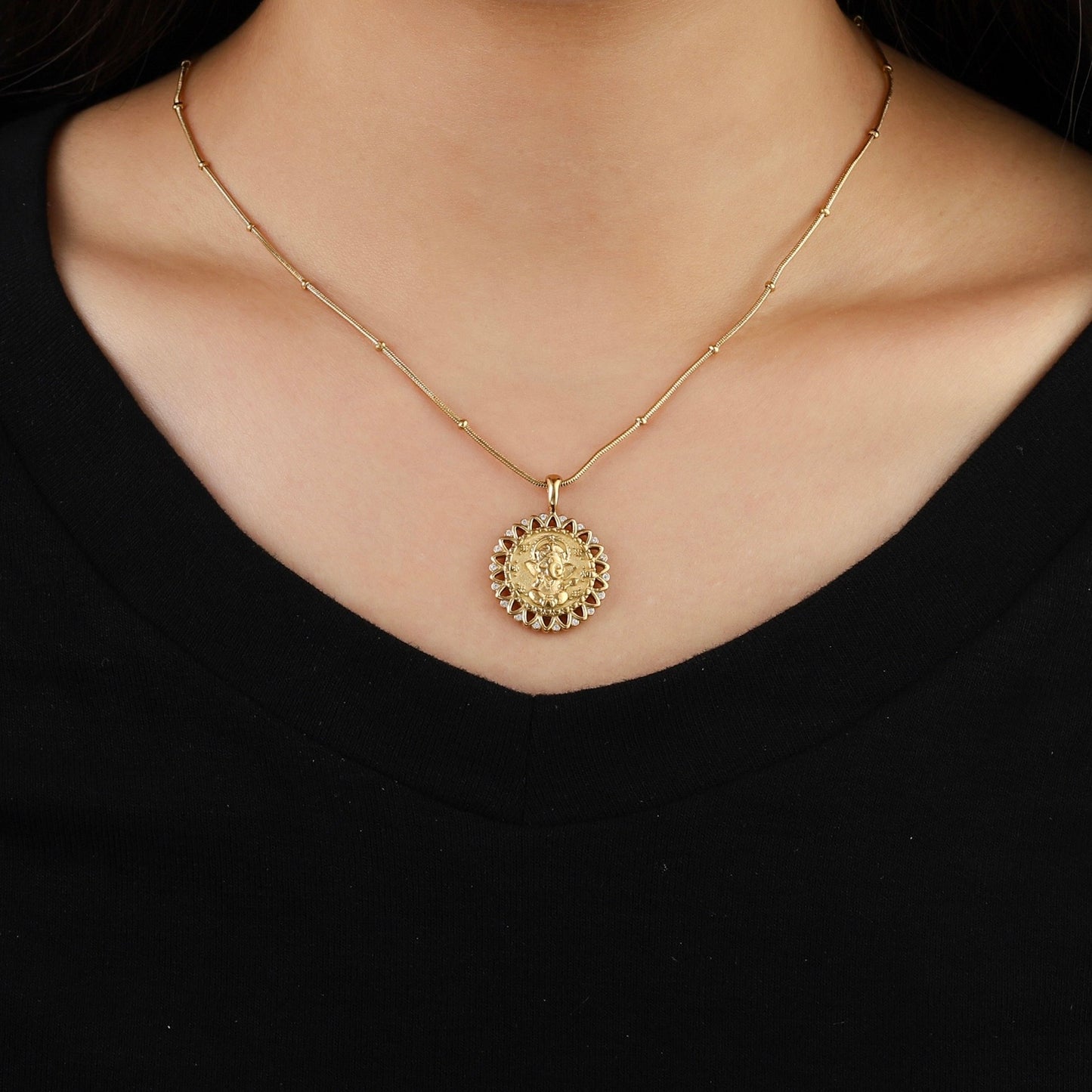 gold ganpati pendant necklace wearing