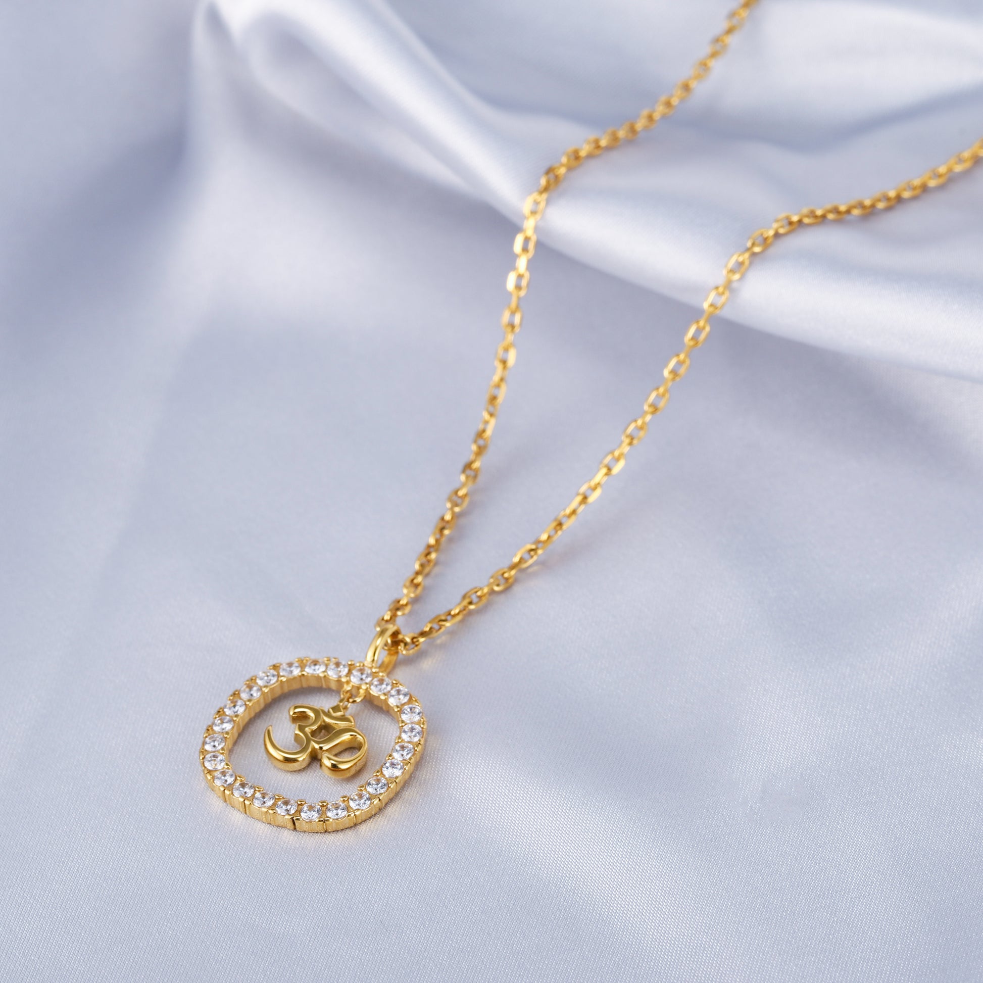 gold om necklace