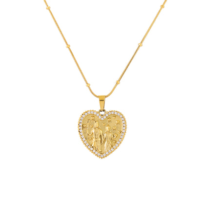 Gold heart-shaped pendant necklace on a white background