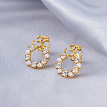 om diamond earrings
