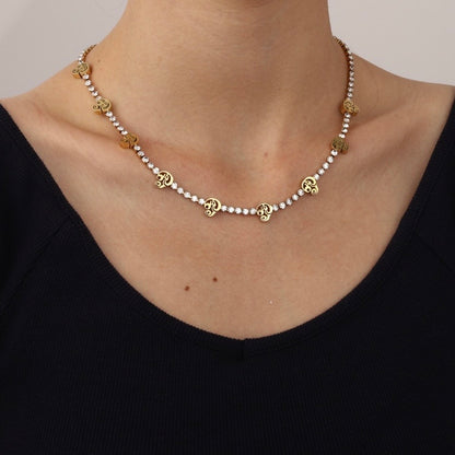 tamil om tennis necklace